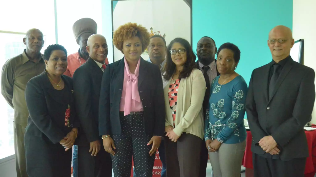 Minister of Community Development, Culture and the Arts, Dr. Nyan Gadsby-Dolly, centre with members of the new NCC Board. From left back, Keith Diaz [Pantribago), Lutalo Masimba [TUCO), Darion Marcelle and Gervon Abraham. In front, Jacqueline Springer-Dillon, Colin Lucas, PS Angela Edwards, Dr. Susan Burke and Ainsworth Mohammed.
