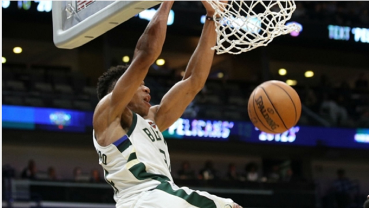 Antetokounmpo's triple-double helps Bucks pull away late for win