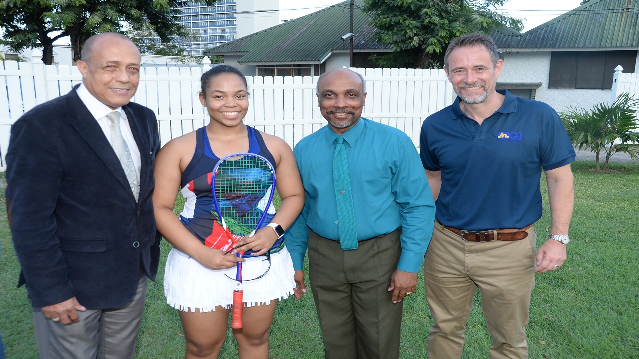 Young Caribbean squash star, Megan Best (2nd left) poses with (from left) Special Advisor to the Minister of Sport, Allie McNab, President of the Jamaica Olympic Association, Christopher Samuda and President of the Jamaica Squash Association, Chris Hind at the official opening ceremony of the 2018 JN General Insurance Caribbean Area Squash Associationâ€™s Junior Championships  on Tuesday night  at the Liguanea Club.
