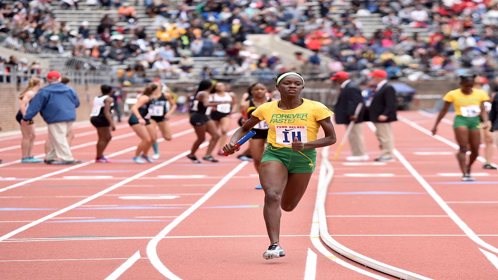 Hydel leads all qualifiers for High School Girls Championship of America  4x100m final; Edwin Allen, St.