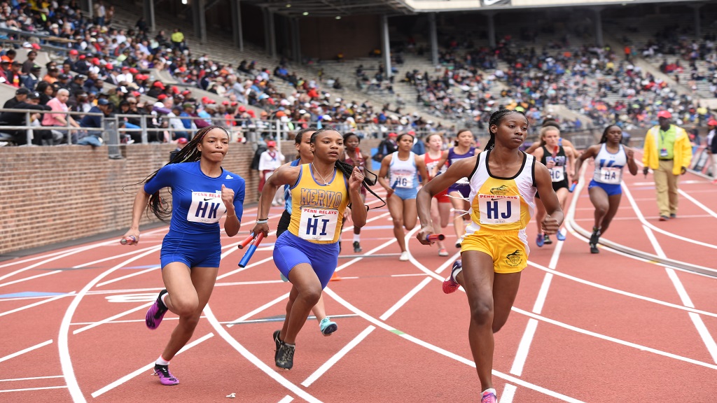 Hydel leads all qualifiers for High School Girls Championship of America  4x100m final; Edwin Allen, St.