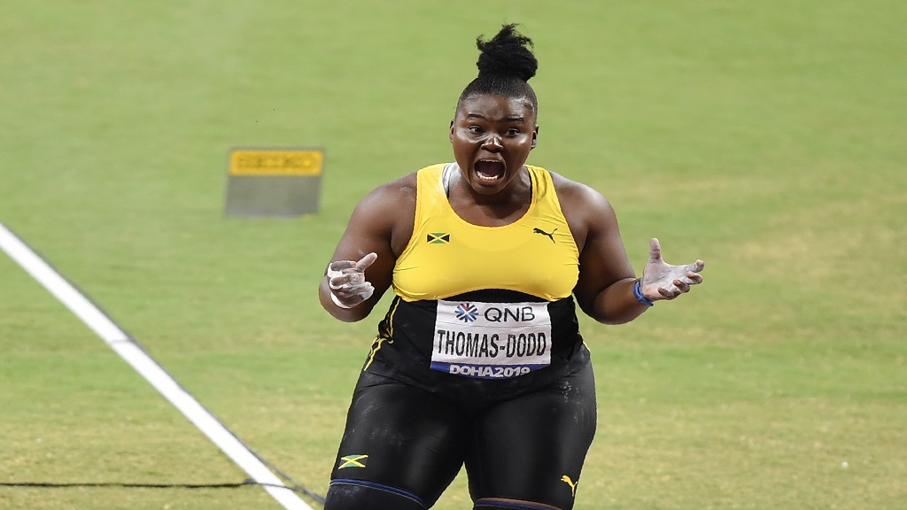 Danniel Thomas-Dodd, of Jamaica, celebrates after winning the silver medal in the woman's shot put final at the World Athletics Championships in Doha, Qatar, Thursday, Oct. 3, 2019. (AP Photo/Martin Meissner).