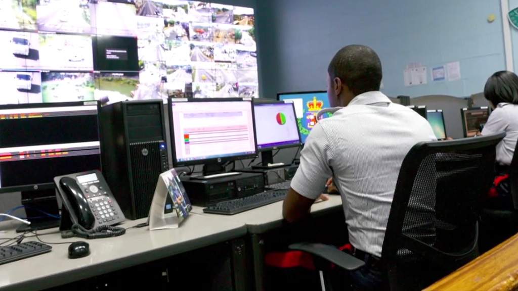 Police officers monitor CCTV cameras at the Police Emergency Control Centre.