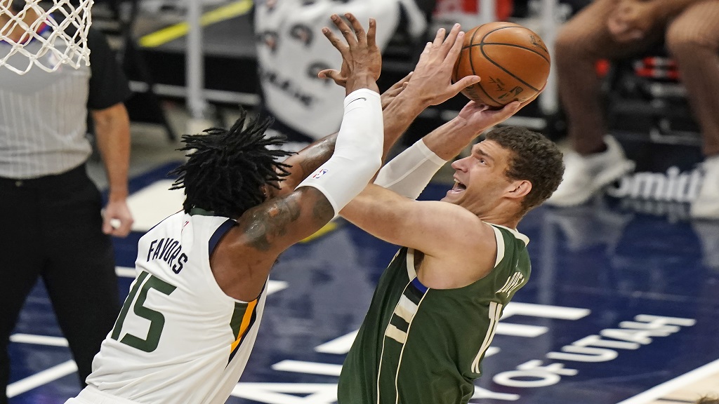Utah Jazz's Donovan Mitchell, right, celebrates with Joe Ingles (2) after  scoring a 3-pointer against the Orlando Magic in the first half during an  NBA basketball game Saturday, April 3, 2021, in