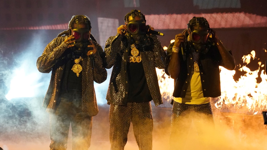 Takeoff, from left, Quavo and Offset, of Migos, perform at the BET Awards on Sunday, June 27, 2021, at the Microsoft Theater in Los Angeles. (AP Photo/Chris Pizzello)