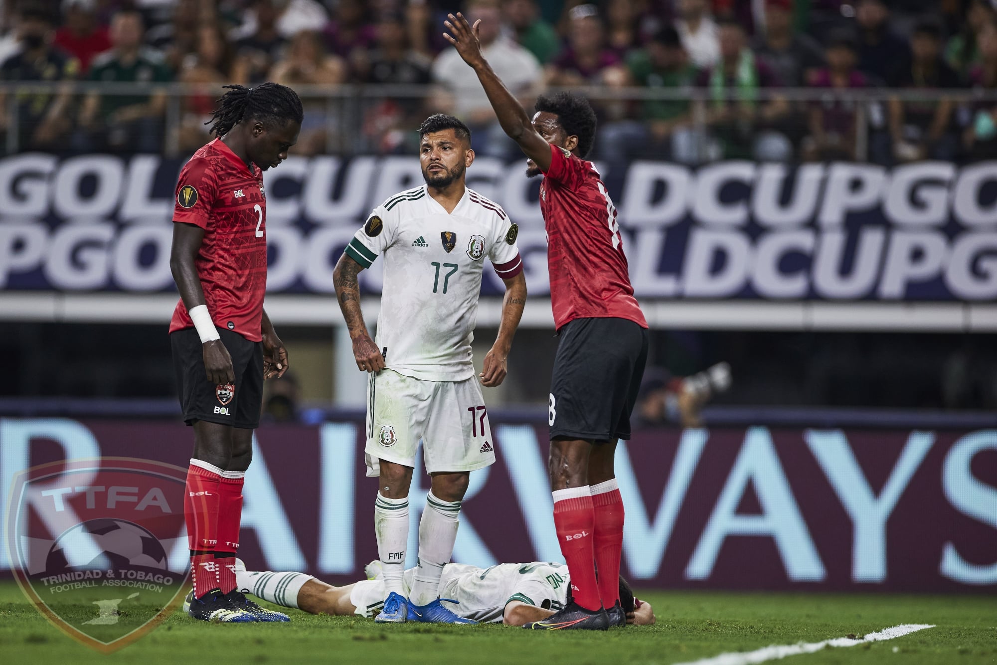 ARLINGTON, TX - JULY 10: Mexico and Trinidad and Tobago players