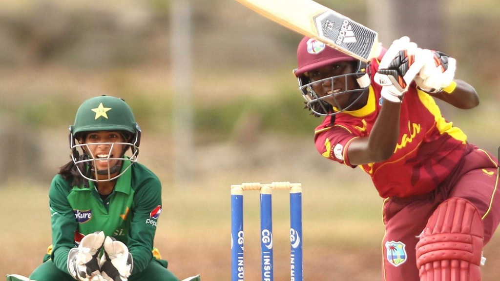 West Indies' Stafanie Taylor hits a boundary during her unbeaten century against Pakistan Women in the first match of their five-match One-Day International series in Antigua on Wednesday, July 7, 2021.