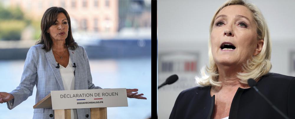 FILE - This combo of file photos shows at left, Socialist mayor of Paris Anne Hidalgo announces her candidacy for the upcoming presidential election in France, and at right, French far-right National Rally leader Marine Le Pen gives a press conference, at the National Assembly, in Paris on Oct. 7, 2019. The two politicians have declared their intentions to seek to become France’s first female president in next year’s election. (AP Photo/Michel Euler/Thibault Camus)
