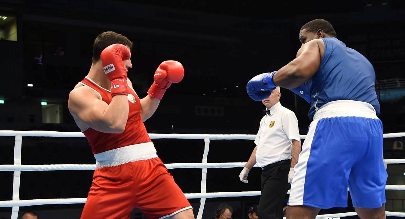 Trinidad and Tobago's Nigel Paul fought Petar Belberov in Doha in 2015. 