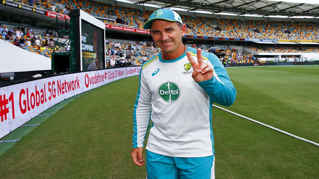 Australian coach Justin Langer gestures after winning the first Ashes cricket test against England at the Gabba in Brisbane, Australia, on Dec. 11, 2021. (AP Photo/Tertius Pickard, File).