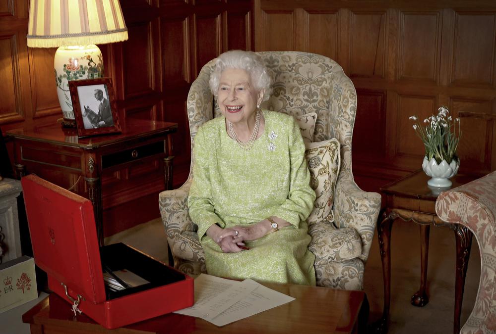 In this handout image released by Buckingham Palace on Feb. 6, 2022, Britain's Queen Elizabeth II is photographed at Sandringham House to mark the start of Her Majesty's Platinum Jubilee Year, on Feb. 2, 2022 in Sandringham, England. Queen Elizabeth II has offered her support to have the Duchess of Cornwall become Queen Camilla — using a special Platinum Jubilee message to make a significant decision in shaping the future of the British monarchy. (Chris Jackson/Buckingham Palace via AP)