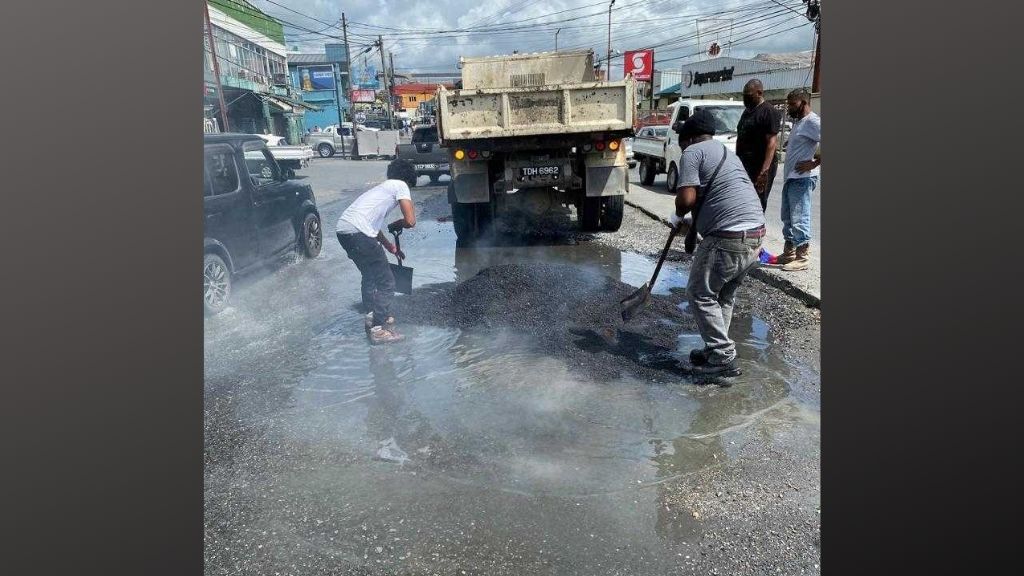 File photo of road patching work in progress.