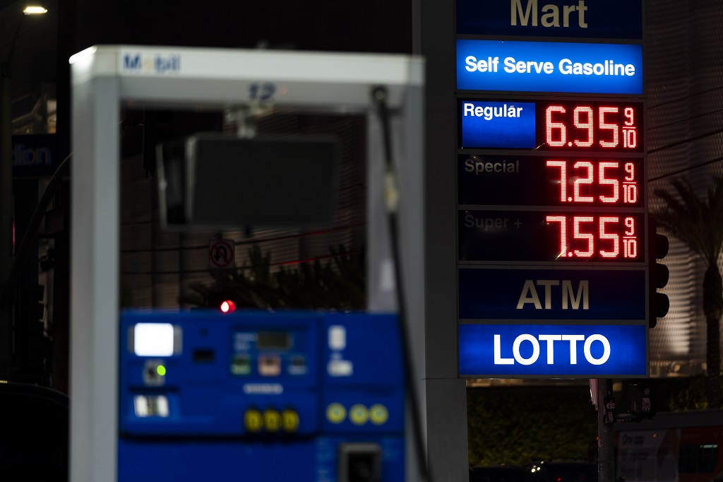 Gas prices are displayed at a Mobil gas station in West Hollywood, California, Tuesday, March 8, 2022. The average price for a gallon of gasoline in the US hits a record $4.17 on Tuesday as the country prepares to ban Russian oil imports. (AP Photo/Jae C. Hong)