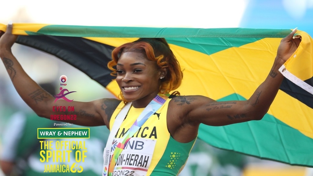 Elaine Thompson-Herah, of Jamaica, celebrates after finishing third for bronze in the final of the women's 100m at the World Athletics Championships on Sunday, July 17, 2022, in Eugene, Ore. (PHOTO: Marlon Reid).


