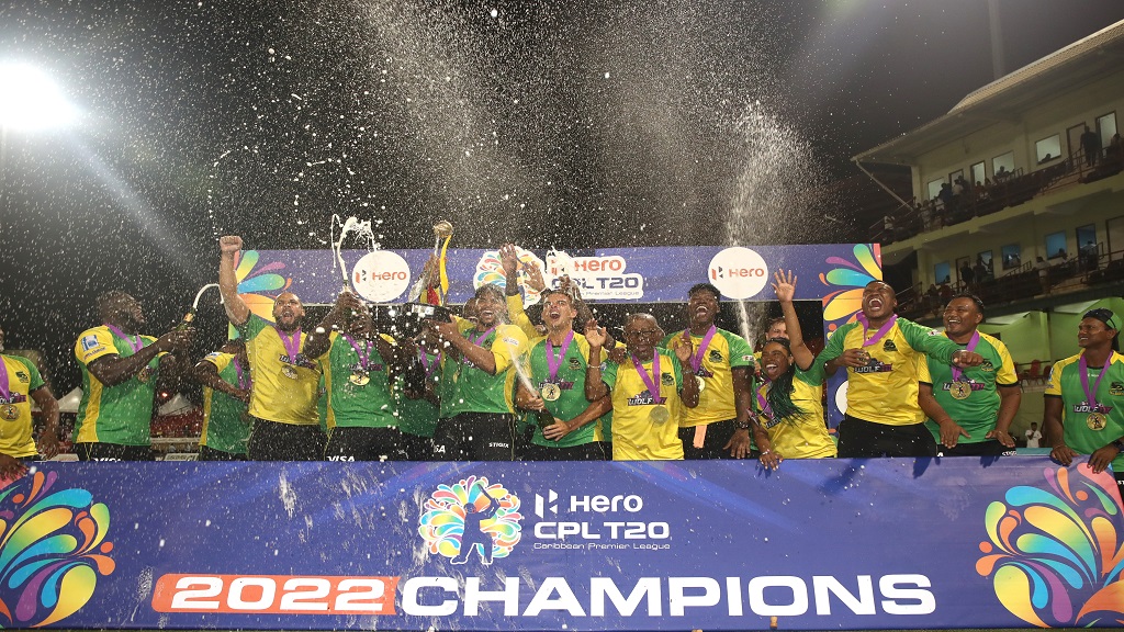 Jamaica Tallawahs players celebrate after winning their third CPL trophy with a dominant eighth-wicket victory over Barbados Royals in the final at Providence Stadium in Guyana on Friday, September 30, 2022. (PHOTO: Ashley Allen - CPL T20 via Getty Images).