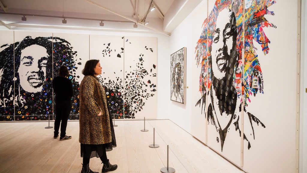 Images of the late reggae pioneer Bob Marley appear at the press launch for the exhibit "Bob Marley One Love Experience" at the Saatchi Gallery in London on February 2, 2022. (Alex Brenner via AP)