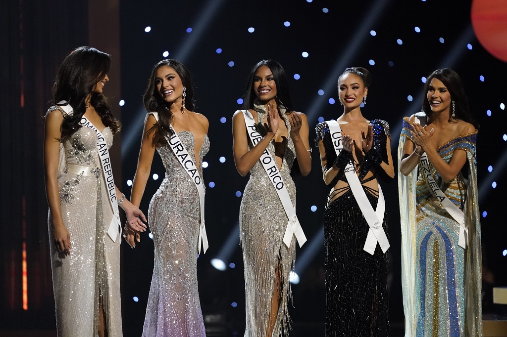 The final five contestants are announced during the final round of the 71st Miss Universe Beauty Pageant in New Orleans, Saturday, January 14, 2023. Left to right are Miss Dominican Republic Andreina Martinez, Miss Curacao Gabriela Dos Santos, Miss Puerto Rico Ashley Carino, Miss USA R'Bonney Gabriel and Miss Venezuela Amanda Dudamel. (AP Photo/Gerald Herbert)