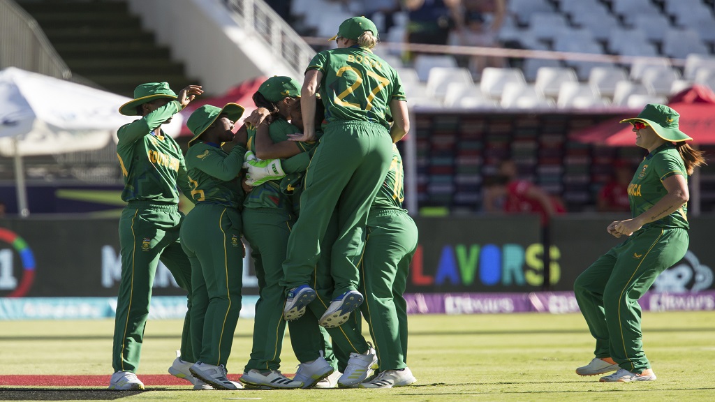 South Africa celebrate the wicket of England's Alice Capsey during the Women's T20 World Cup semi final cricket match in Cape Town, South Africa, Friday Feb. 24, 2023. (AP Photo/Halden Krog). 