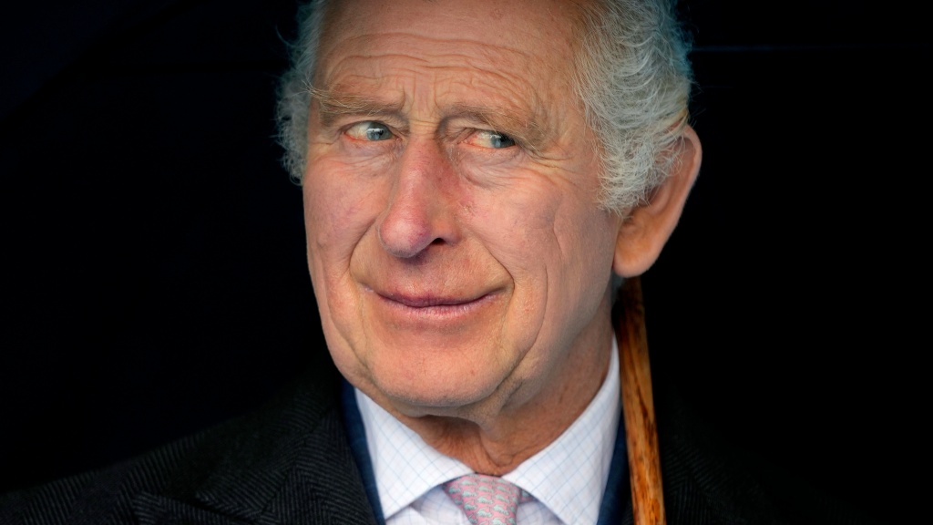 FILE - Britain's King Charles III smiles during a boat trip, in Hamburg, Germany, Friday, March 31, 2023. (AP Photo/Matthias Schrader, Pool, File)