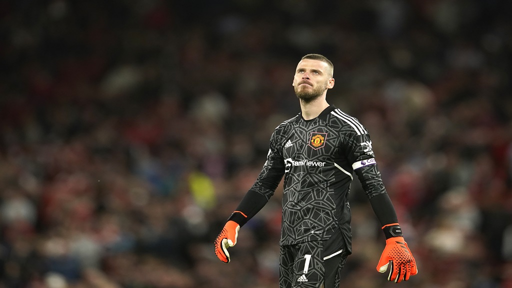 Manchester United's goalkeeper David de Gea reacts after the English Premier League football match against Chelsea at the Old Trafford stadium in Manchester, England, Thursday, May 25, 2023.  (AP Photo/Dave Thompson).


