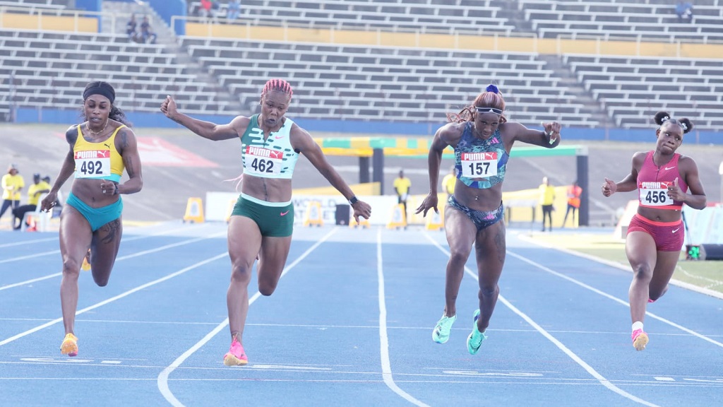 Natasha Morrison (2nd left) gets the better of Elaine Thompson-Herah (left) in semi-final one of the women's 100m on day two of the National Senior and Junior Championships at the National Stadium on Friday, July 7, 2023. (PHOTO: Marlon Reidd).