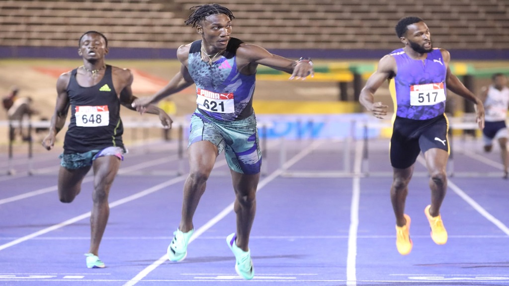 Roshawn Clarke (left) wins the men's 400m hurdles final on day two of the National Senior and Junior Championships at the National Stadium on Friday, July 7, 2023. (PHOTO: Marlon Reid). 