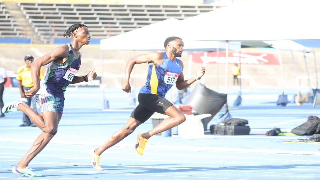 Roshawn Clarke (left) and Jaheel Hyde compete in the second semi-final of the men's 400m hurdles on the opening day of the Jamaica Trials at the National Stadium on Thursday, July 6, 2023. (PHOTo: Marlon Reid).