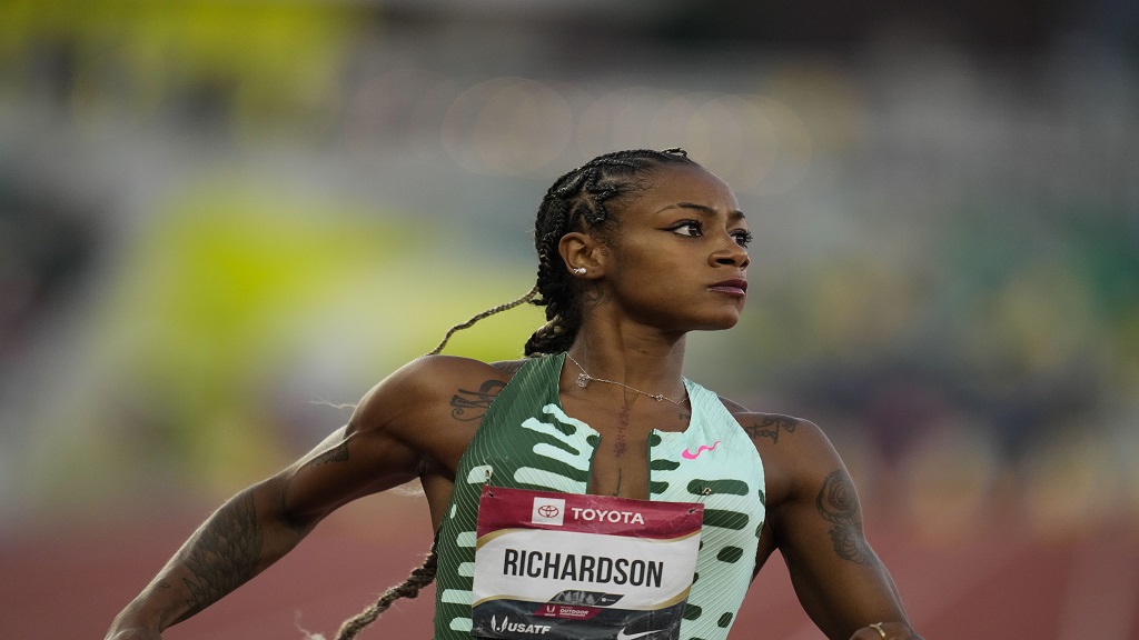 Sha'Carri Richardson wins the women's 100m finals during the U.S. track and field championships in Eugene, Ore., Friday, July 7, 2023. (AP Photo/Ashley Landis).


