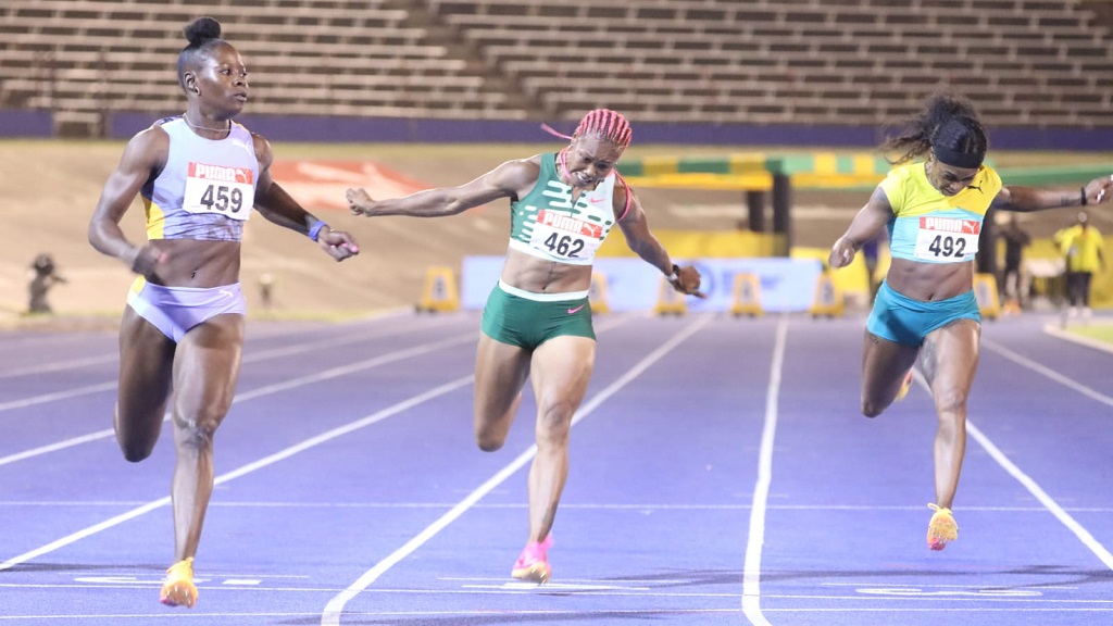 Shericka Jackson (left) wins the women's 100m on day two of the National Senior and Junior Championships at the National Stadium on Friday, July 7, 2023. (PHOTO: Marlon Reid).