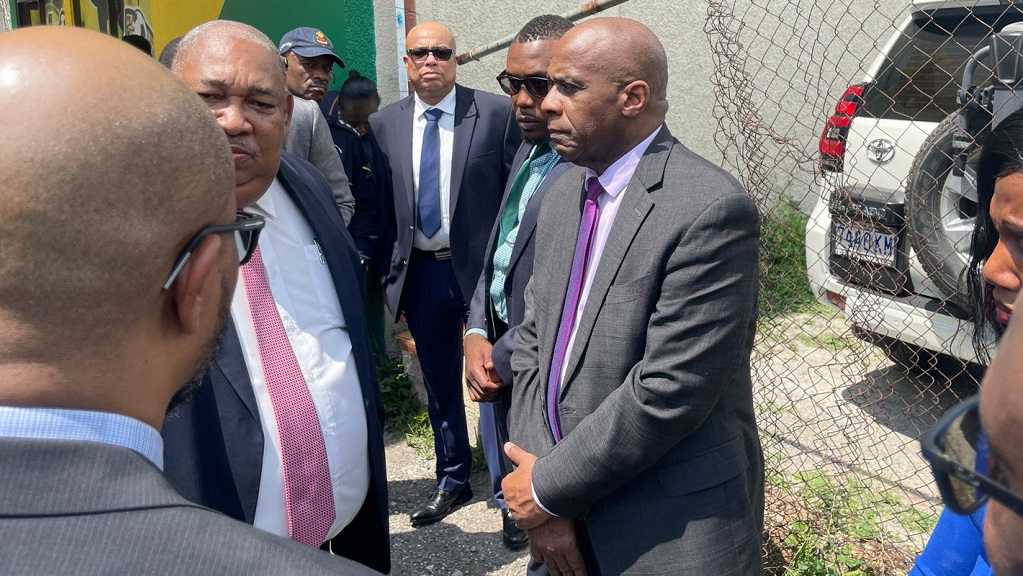 File photo of the scene where Executive Director of the Integrity Commission (IC), Greg Christie (centre), responded, "You should ask the Government that" to a media request for his perspective on the robbery and shooting of an executive of the commission outside the agency's New Kingston office in September 2023.