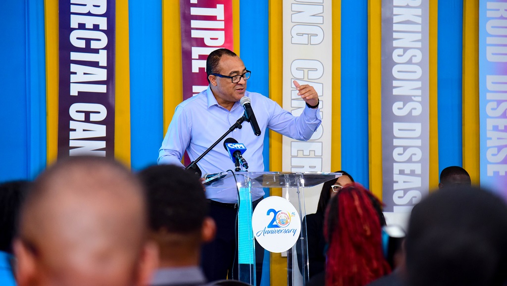 Minister of Health and Wellness, Dr Christopher Tufton, addresses a press conference on Tuesday at the Spanish Court Hotel in New Kingston, to announce the addition of five health conditions under the National Health Fund (NHF) Card Programme. (Photo: JIS)