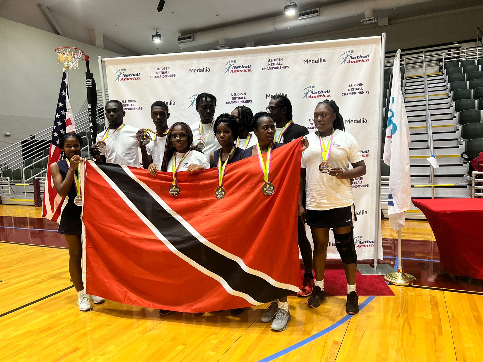 Toco Police Youth Club celebrates their second-place finish at the 2023 US Open Netball Championships. (Photo credit - Toco PYC and Netball America)