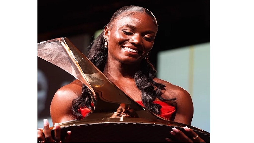 University of Texas' Julien Alfred poses with the 2023 women's Bowerman award.