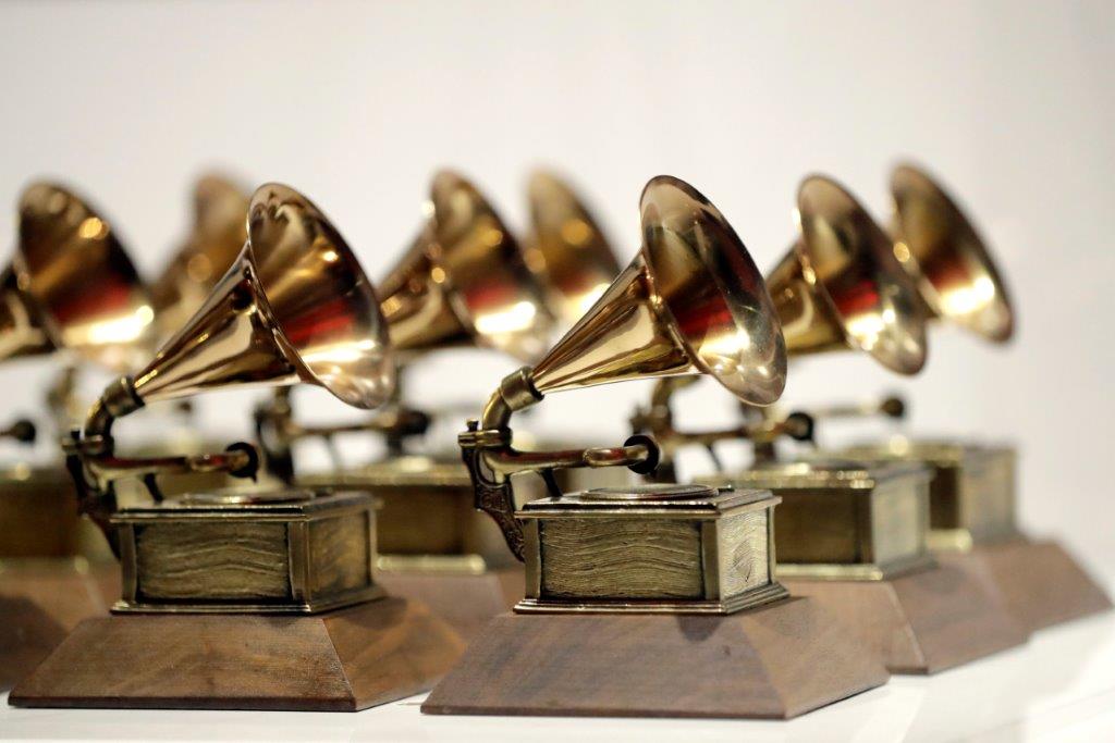 FILE - Grammy Awards are displayed at the Grammy Museum Experience at Prudential Center in Newark, NJ on October 10, 2017. The 66th annual Grammy Awards will take place Sunday, February 4 at the Crypto.com Arena in Los Angeles. (AP Photo/Julio Cortez, File)