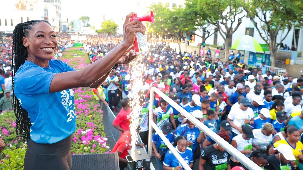 2024 Sagicor Sigma ‘Honour’ Run race patron and two-time World Championships 400mh bronze medallist Rushell Clayton sounds the horn to signal the start of the historic race on Sunday.