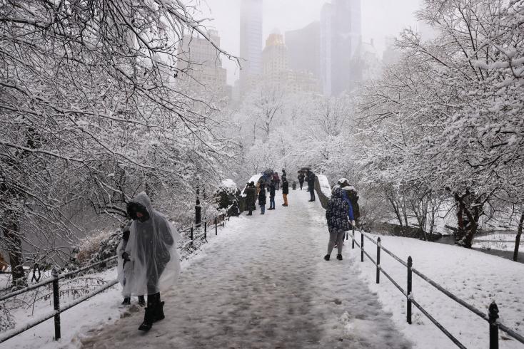 Central Park under the snow, February 13, 2024 in New York after a snowstorm hit the northeast of the United States YUKI IWAMURA / AFP  