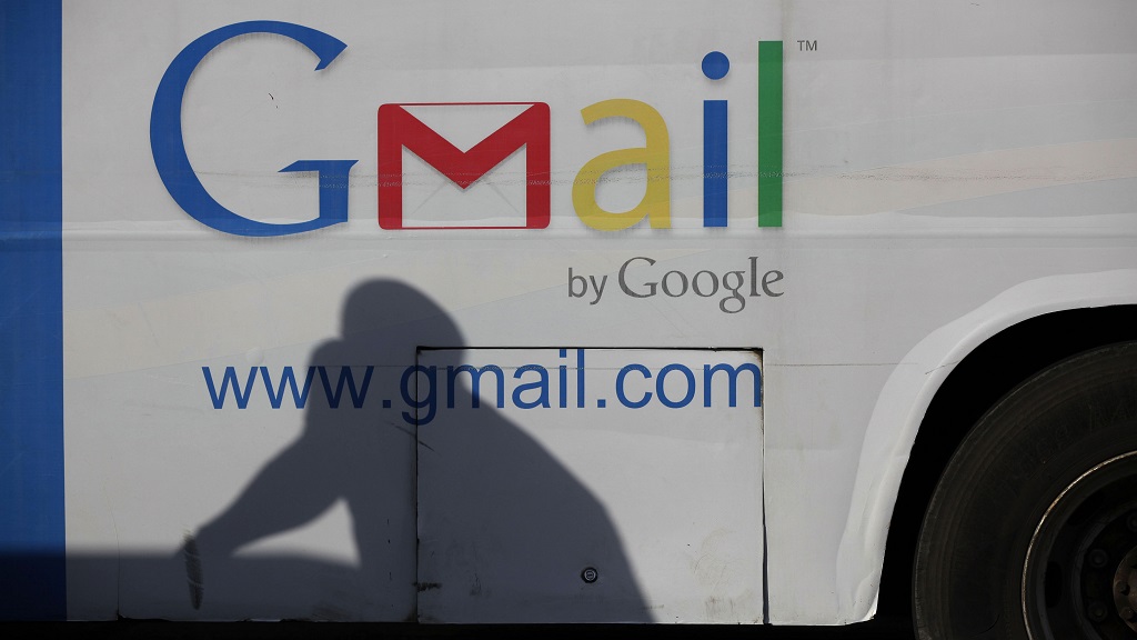 An ad for Google's Gmail appears on the side of a bus on Sept 17, 2012, in Lagos, Nigeria. Google founders Larry Page and Sergey Brin unveiled Gmail 20 years ago on April Fool's Day. (AP Photo/Sunday Alamba, File)