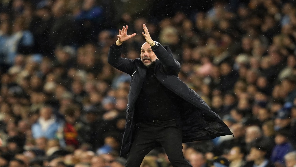  Manchester City's head coach Pep Guardiola gives instructions during the FA Cup quarterfinal football match against Newcastle at the Etihad Stadium in Manchester, England, Saturday, March 16, 2024. (AP Photo/Dave Thompson).