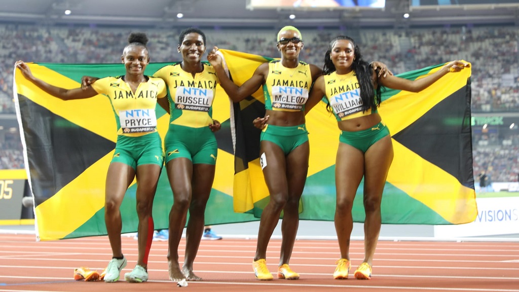 Members of Jamaica's silver medal-winning team celebrate following the final of the women's 4x400m relay at the World Athletics Championships in Budapest, Hungary, on Sunday, August 27, 2023. (PHOTO: Marlon Reid).