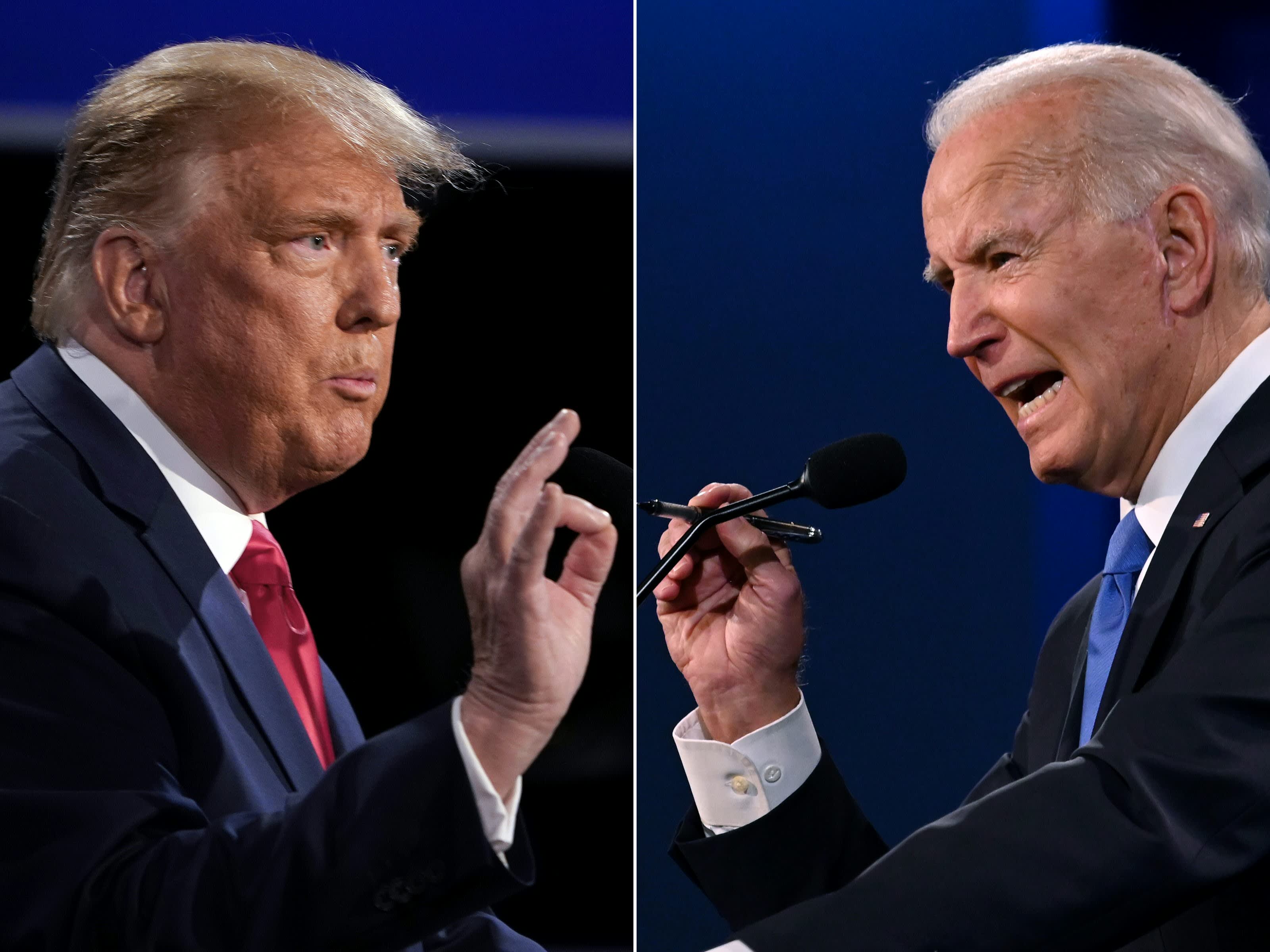 Donald Trump, left, and President Joe Biden during the final presidential debate at Belmont University in Nashville, Tennessee, on Oct. 22, 2020.  BRENDAN SMIALOWSKI | AFP | Getty Images  