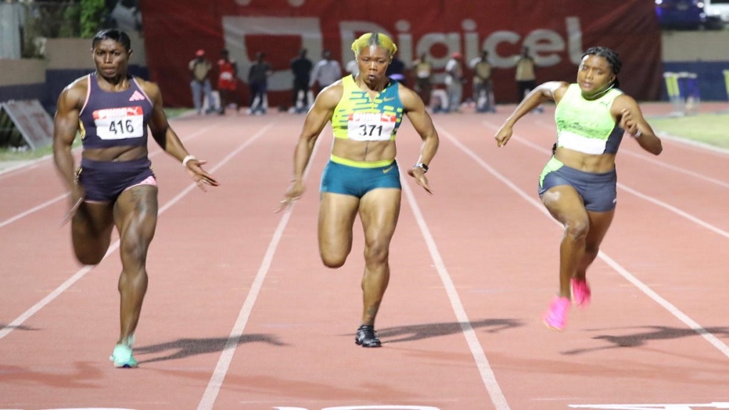  Jodean Williams (left) of SprinTec powers to victory in the women's 100m at the Velocity Fest 15 meet at Ashenheim Stadium at Jamaica College on Saturday, April 20, 2024. (PHOTO: Marlon Reid).






