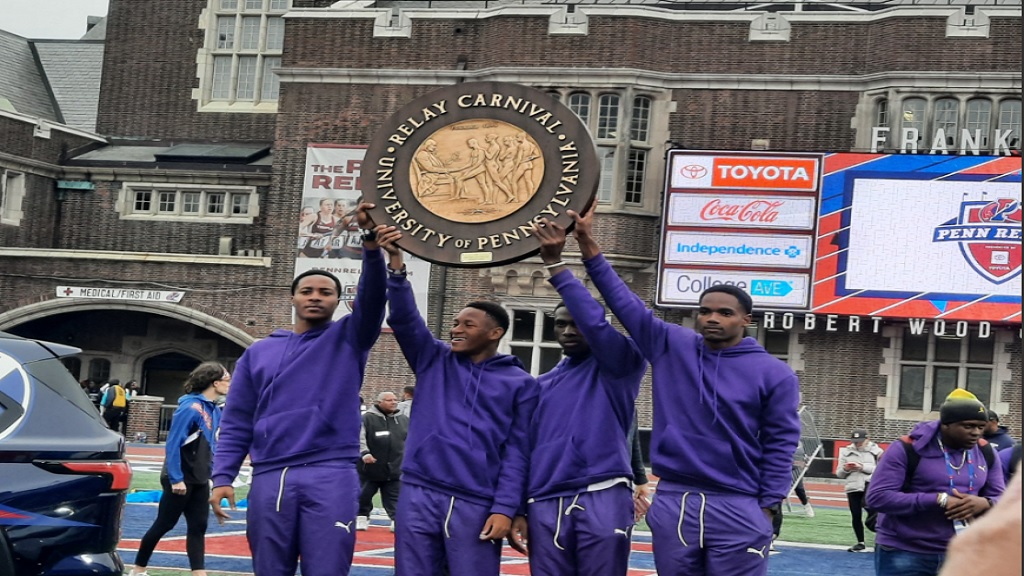 Kingston College's 4x400m team holds up the Championship 'Wheel' after winning the Championship of America race at the 128th Penn Relays Carnival at Franklin Field in Philadelphia, Pennsylvania on Saturday, April 27, 2024. (PHOTO: Melton Williams).
