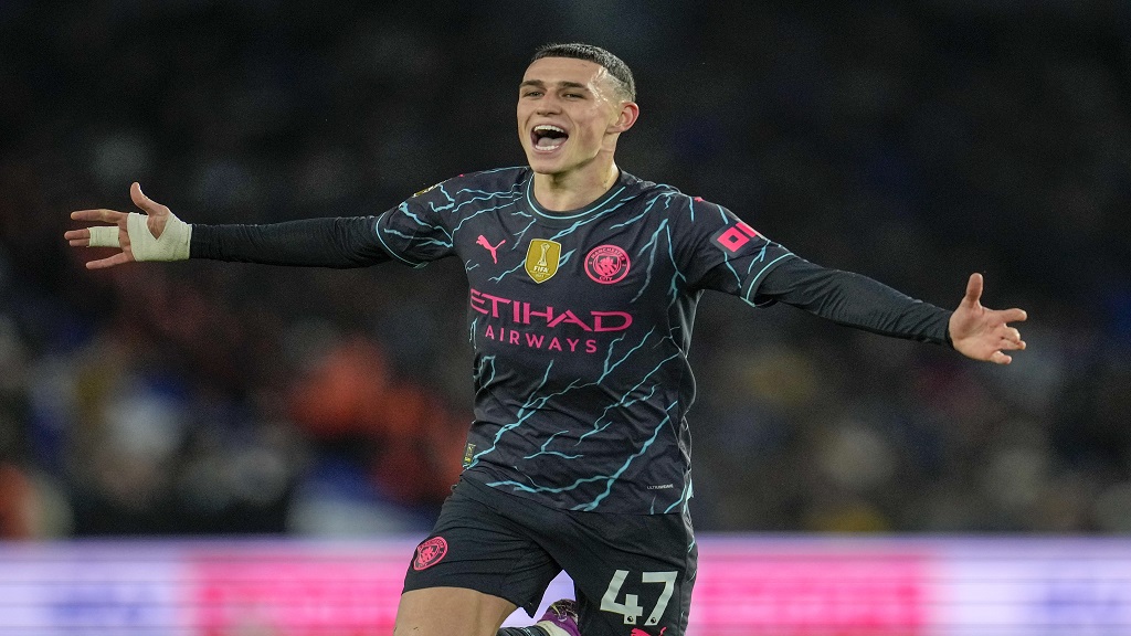 Manchester City's Phil Foden celebrates after scoring his side's second goal during the English Premier League football match against Brighton at the Falmer Stadium in Brighton, England, Thursday, April 25, 2024. (AP Photo/Kin Cheung).