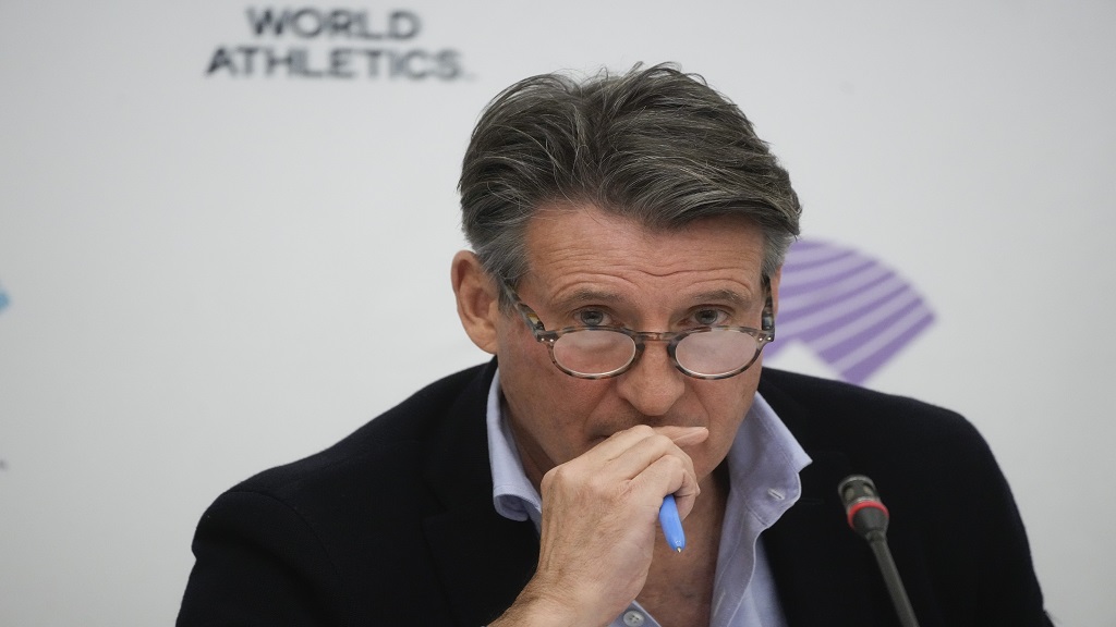 World Athletics president Sebastian Coe listens to a journalist's question during a press conference at the conclusion of the World Athletics meeting at the Italian National Olympic Committee, headquarters, in Rome, Wednesday, Nov. 30, 2022. Track and field is set to become the first sport to introduce prize money at the Olympics, with World Athletics saying Wednesday, April 10, 2024, it would pay $50,000 to gold medallists in Paris. (AP Photo/Gregorio Borgia, File).  