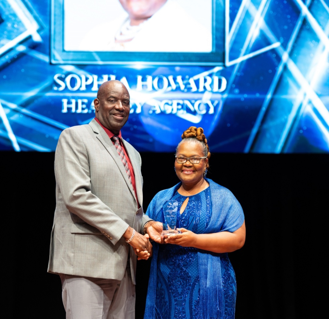 Taking home the most coveted sales awards on the night, was Sophia Howard of the Headley Agency, who was the recipient of the President’s Trophy, the Anthony Kennedy Award for the Leading Producer – Case Count, and the D.W. Allan Award for the Leading Producer – Production. Here she receives her award from Vice President – Barbados Sales, Gay Griffith. (Photo credit: Sagicor Inc.)