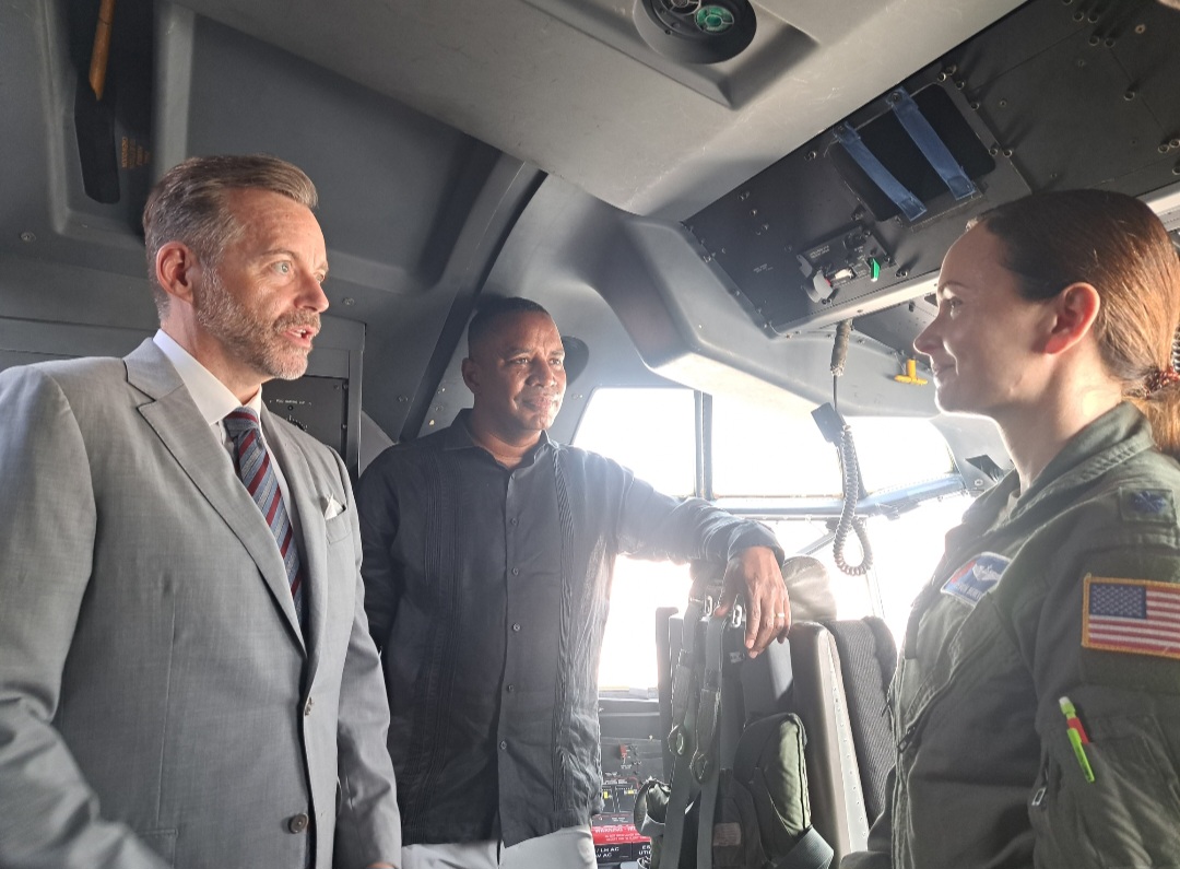 L-R: Director of the National Hurricane Centre (NHC), Dr. Michael Brennan, Minister of Home Affairs and Information, Wilfred Abrahams, and 53rd Weather Reconnaissance Squadron Chief Aerial Reconnaissance Weather Officer, Lt. Col. Kaitlyn McLaughlin.