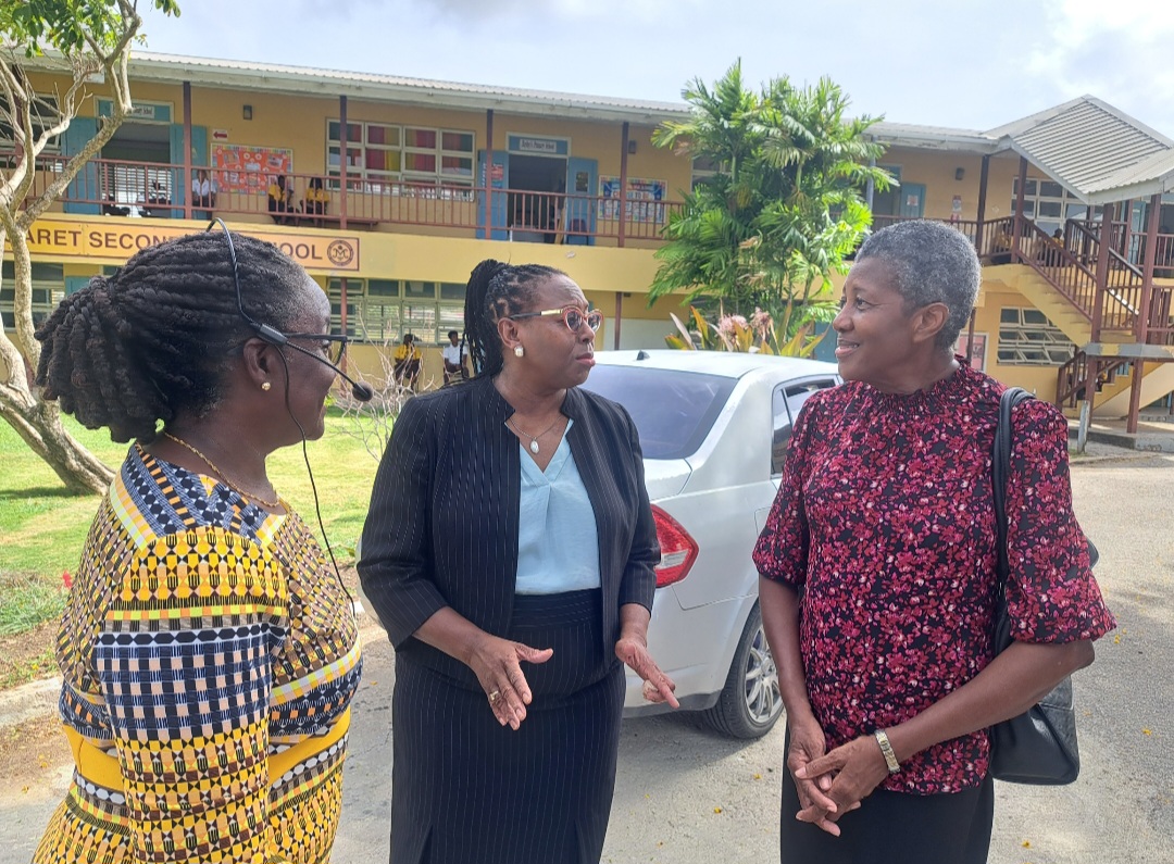L-R: Principal of the Princess Margaret Secondary School (PMSS), Ms Agard, Minister of Education, Technological and Vocational Training, Ms Kay McConey, Senior Education Officer and Head of Secondary Schools at the Ministry of Education, Ms Patricia Warner.