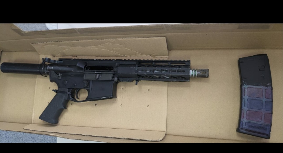 Police also recovered an AR rifle at the scene. Photo courtesy the TTPS