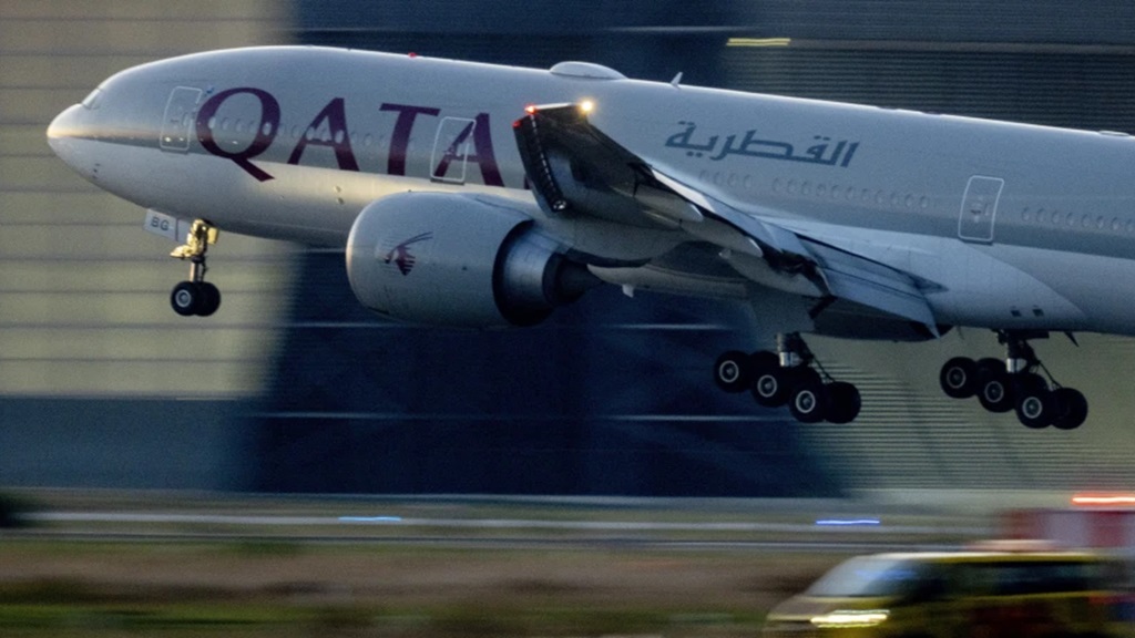  A Qatar airways plane lands at the airport in Frankfurt, Germany, as the sun rises on September 25, 2023. (AP Photo/Michael Probst, File)