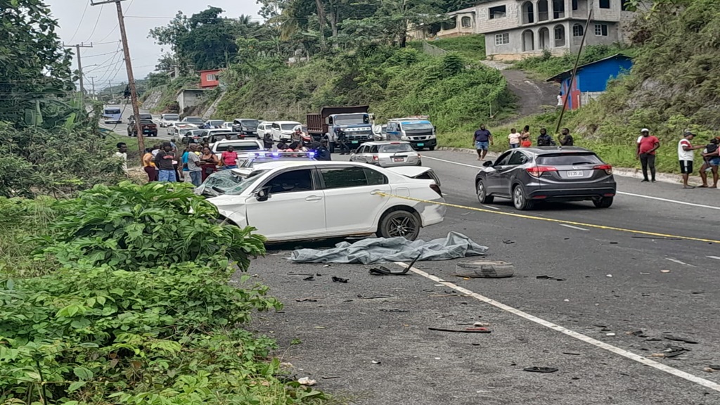 The scene of a four-vehicle crash on the Lindos Hill main road in Westmoreland on Wednesday that left two persons dead.